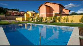 Casa 2 suítes com ar - Até 6 pessoas - em condomínio com piscina